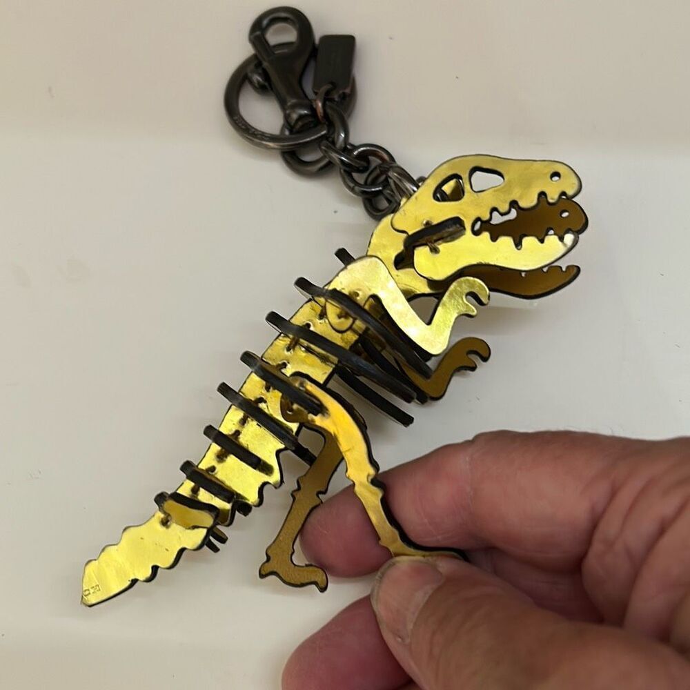 COACH Gold Rexi Puzzle Keychain